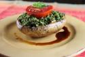 Raw Portobello Mushroom Stuffed with Basil Pesto Photo